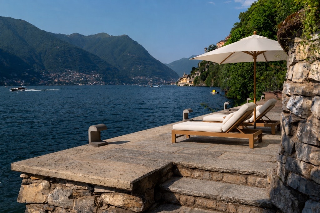 Private boat dock with sun loungers and panoramic lake and mountain views